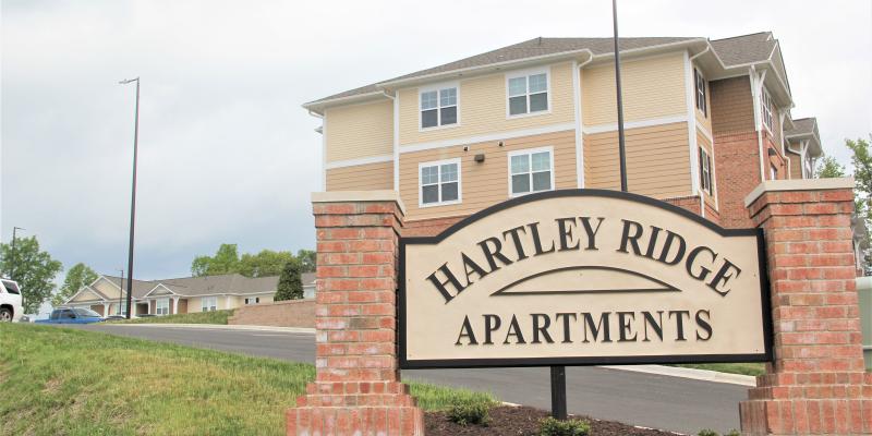 Hartley Ridge Offers Safe, Affordable Homes for High Point Families Photo of Hartley Ridge Apartments sign with building in the background